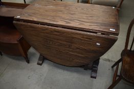 A mid 20th Century oak gateleg table