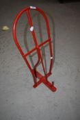 A metal saddle rack