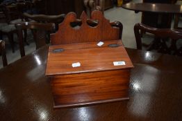 A Victorian mahogany candle box