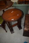 An Edwardian mahogany circular nest of tables