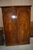 A Victorian mahogany double wardrobe having drawers to interior, width approx. 148, height 209cm