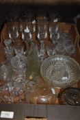 A box of mixed vintage and modern glass, including wine and spirit glasses.