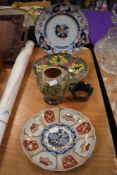 Two Royal Doulton plates having floral design edged with Greek key motif, d3087 marked to underside,