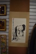 A Chinese paper and fabric wall hanging depicting a horse, with box.