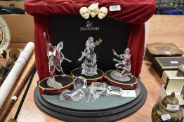 A modern Swarovski silver crystal glass figurine Masquerade set complete with stage, Pierrot,