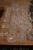 A large collection of vintage and traditional glass ware, including Victorian etched wine glasses,