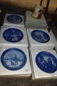 A collection of 1970s and 80s Royal Copenhagen Christmas plates.