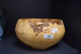 A turned burr wych elm bowl.