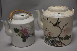Two oversized Chinese tea pots, one late 19th/early 20th century, the other 20th century, having