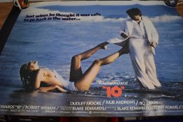 Four 1970s and 80s movies posters, including 'Dressing to kill'.