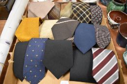 A collection of gents mixed vintage and retro neck ties.