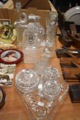 A mixed lot of vintage glass to include cut and pressed glass, including decanters, dressing table