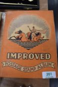 A vintage stamp album containing a selection of stamps or British and Foreign interest.