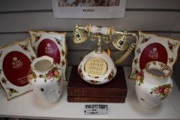A mixed lot of Royal Albert Old Country Roses items, comprising; telephone, photo frames and two