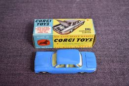 A Corgi Toys diecast, 229 Chevrolet Corvair in blue with yellow interior, in original box
