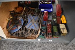 A shelf of 0 gauge including Hornby loco's , Rolling Stock, Accessories, miniature Lead Figures
