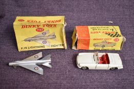 Two Dinky diecasts, 113 MGB Sports Car in white with red interior, missing driver and 737 PIB