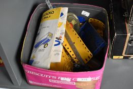 A small collection of vintage Meccano including part motor