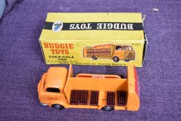 A Budgie Toys diecast, 228 Coca-Cola Van with Removable Crates in orange with red livery, spun hubs,