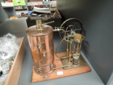 A part built Live Steam Model having single cylinder vertical brass engine and vertical copper