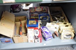 A shelf of mixed diecasts and tin plate Cars and accesories along with modern Schuco, Frog Areoplane