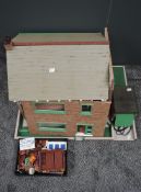 A vintage two storey Dolls House along with a collection of modern Dolls House Furniture