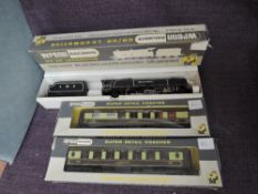 A Wrenn 00 gauge W2227A 4-6-2 Sir William Stanier Loco & tender along with two Pullman carriages