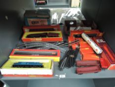 A shelf of Hornby and similar 00 gauge including Triang R871 LMS 4-6-2 King George VI Loco &