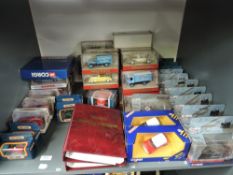 A shelf of modern diecasts including Dinky, Corgi, Matchbox, Matchbox Models of Yesteryear, all