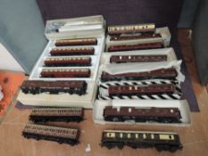 Fourteen 00/HO scale kit built LMS and similar Carriages along with two Triang 00 gauge Carriages