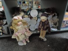 Twentry Three Leonardo and Similar Collector's Dolls, all on stands