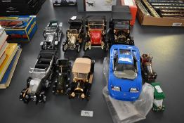 Five Franklin Mint scale models, 1913 Ford Model T, 1911 Stanley Steamer 62 Runabout, 1912 Packard