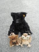Two modern Steiff Bears, 003509 Black Bear, 029578 Baby Bear olong with a similar Owl