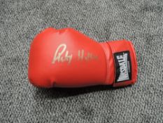 A modern Lonsdale boxing glove bearing printed signature Ricky Hatton