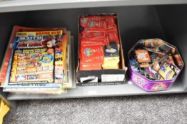 Two boxes and a tin of 21st century Topps Match Attax Trading Cards and Skylander Cards, in five