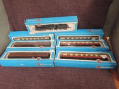 An Airfix 00 gauge 0-6-0 LMS Loco & Tender 4454 along with six Airfix 00 gauge Carriages, all