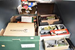 A shelf of Hornby, Wrenn and similar Rolling Stock, Accessories and Track, some boxed
