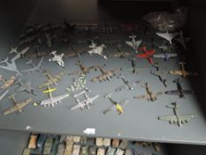 Two shelves of modern Corgi and similar diecast Military Vehicles and Aeroplanes