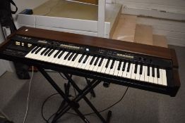 A Roland VK-7 electric keyboard, for that Hammond sound! Please note that the usual fault on the