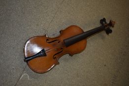 A traditional violin, of small proportions (child size) , unlabelled two piece back of approx. 11