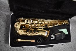 A Japanese saxophone and case, J Michael Japan, in fitted case