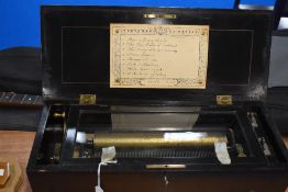 A 19th Century swiss music box, playing 8 airs