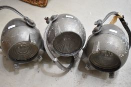 Three vintage Strand stage lights (sold as decorative, with wire trimmed, would need rewire and test