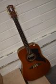 A vintage Eko jumbo acoustic guitar with pickup