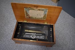 A 19th Century mahogany cased music box , 12 airs
