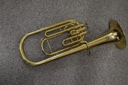A Yamaha Eb brass tenor horn, model YAH 201, serial number 001318, with plush lined hard case and