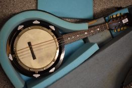 An early 20th Century banjo mandolin , J E Dallas maker, stamped 415 Strand, serial number 5685,