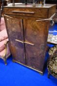 A 1930s walnut tallboy