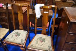 A pair of early 20th century Queen Anne style bedroom chairs