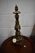A vintage brass table lamp of foliate design